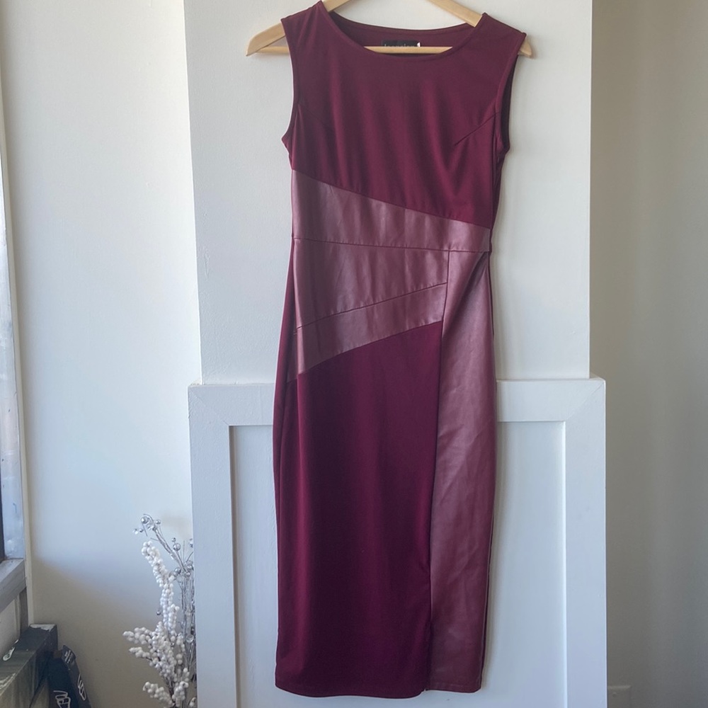 Stretchy curve hugging dress with faux leather